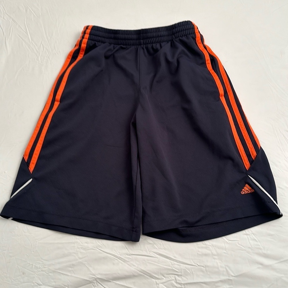 Adidas navy blue and signature logo orange stripes athletic shorts